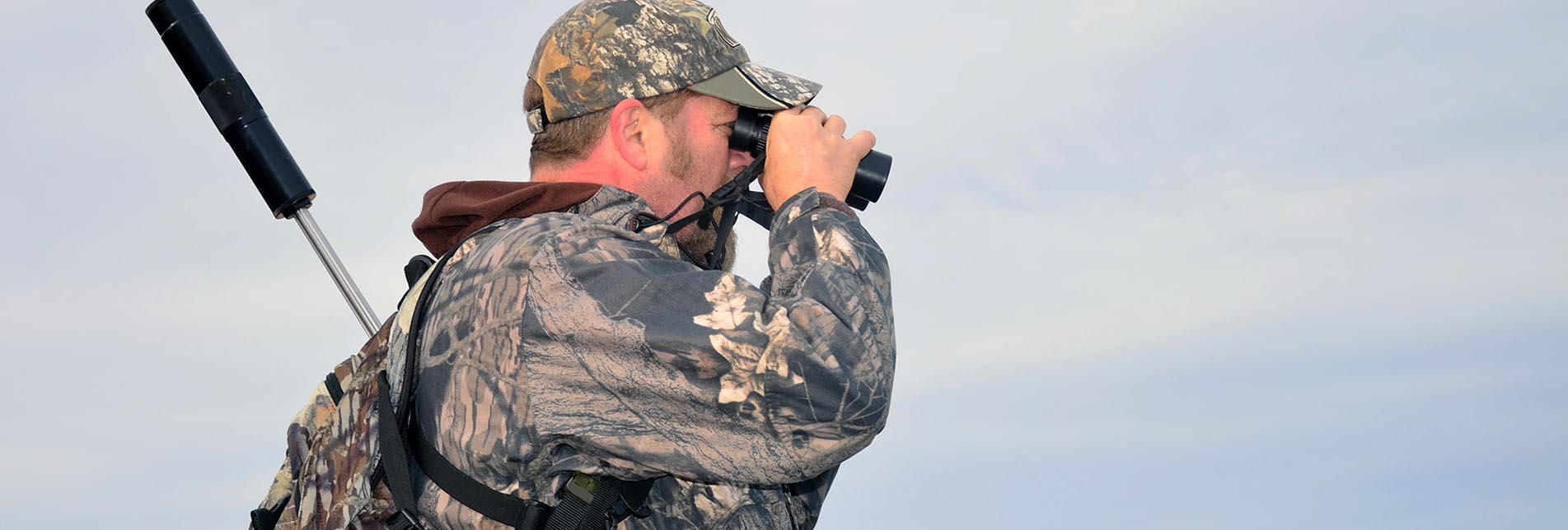 Man Looking Through Binoculars 